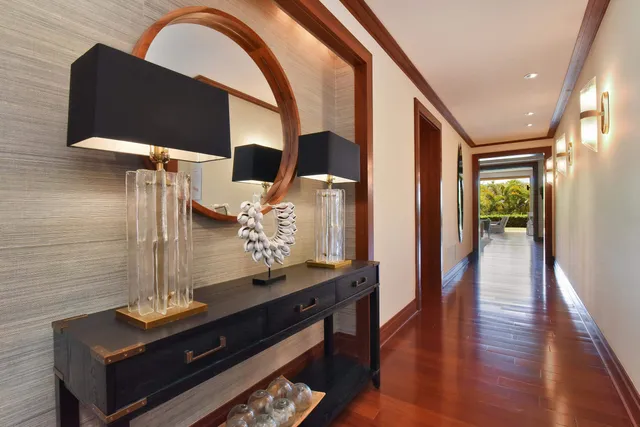 a view of living room with furniture and wooden floor