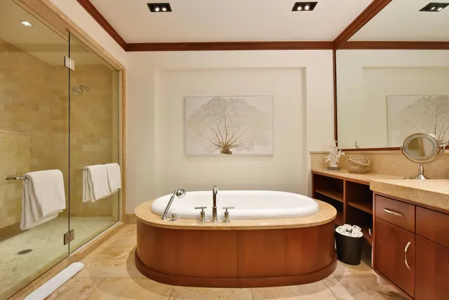 a bathroom with a tub and sink