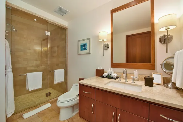 a bathroom with a bathtub and shower