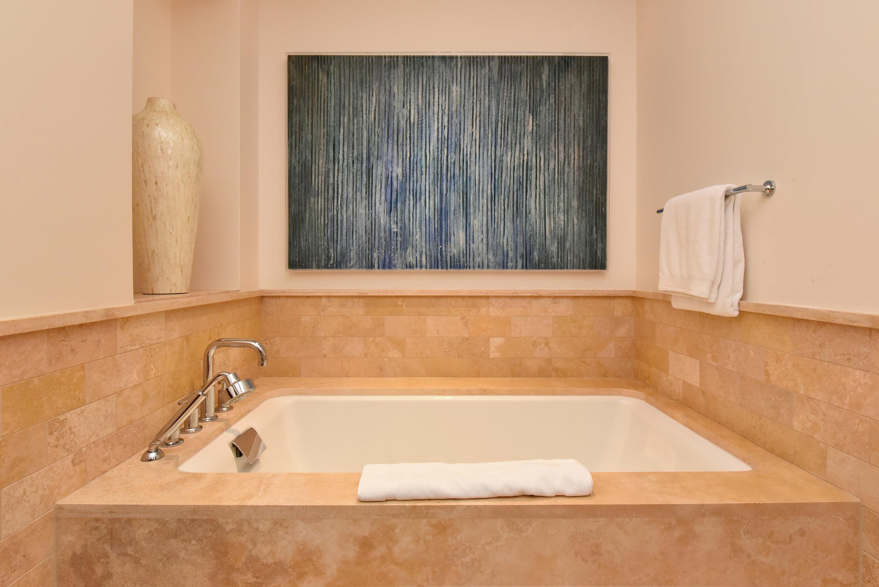 1 Bay Drive, Unit 5102 Lahaina, HI 96761 - Photo 25 of 50 a bathroom with a bathtub and shower