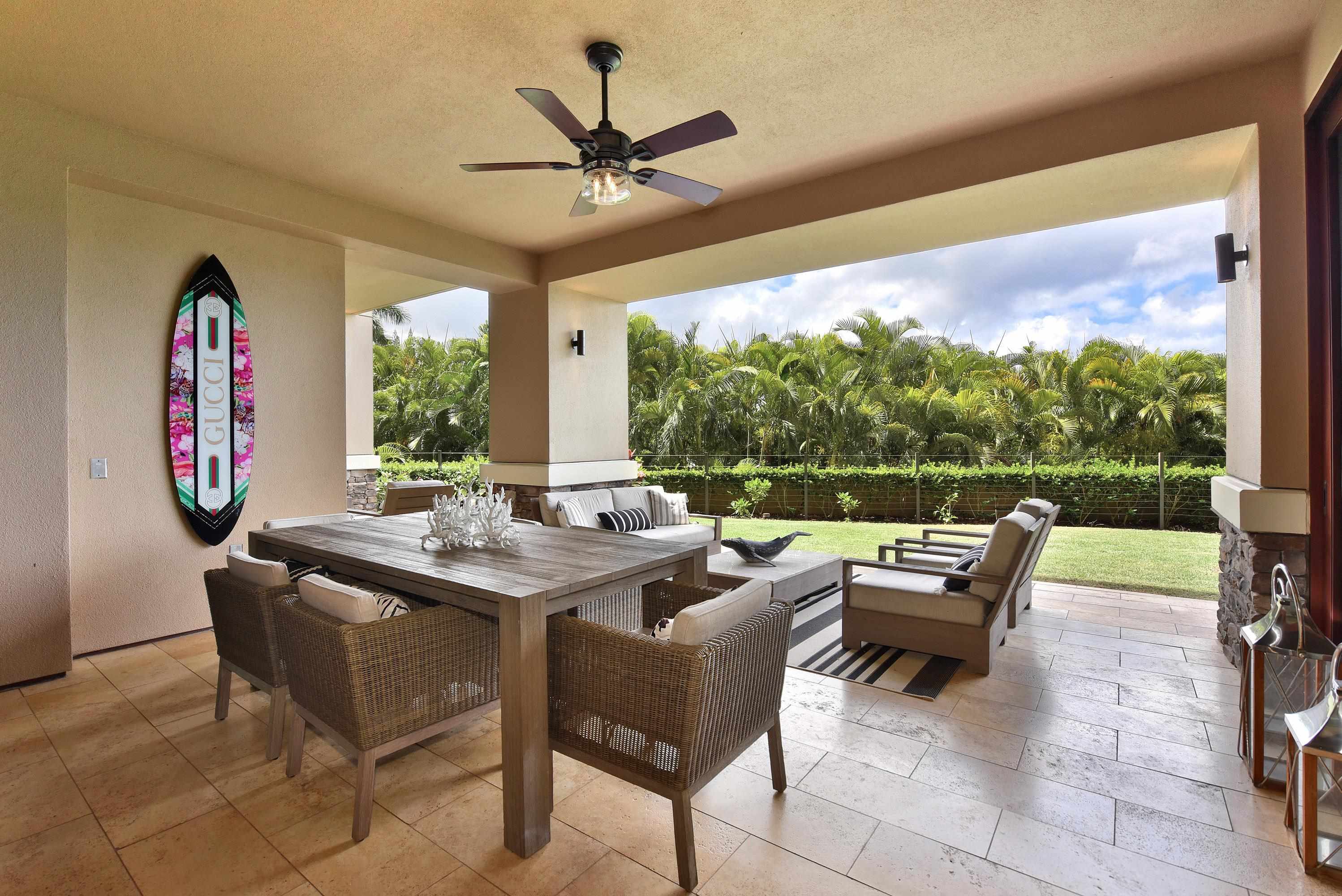 1 Bay Drive, Unit 5102 Lahaina, HI 96761 - Photo 30 of 50 a view of a patio with a dining table and chairs
