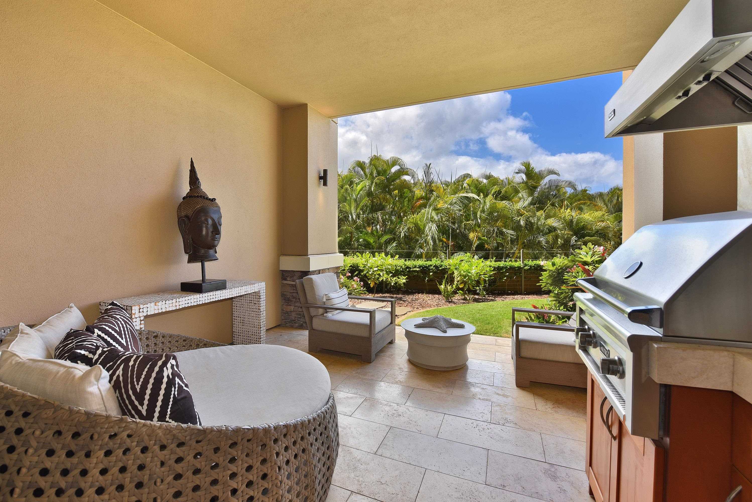 1 Bay Drive, Unit 5102 Lahaina, HI 96761 - Photo 34 of 50 a living room with furniture and a potted plant