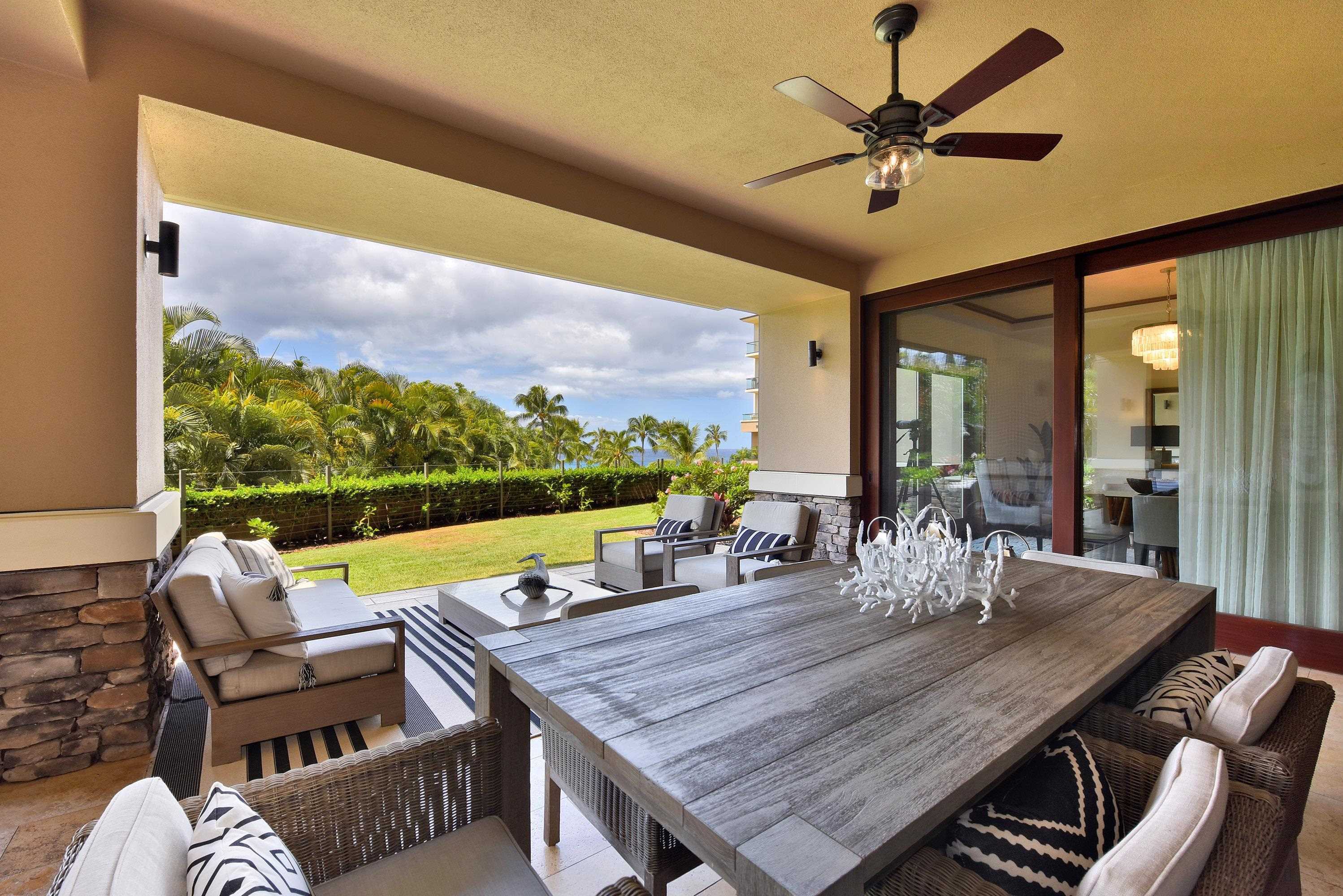 1 Bay Drive, Unit 5102 Lahaina, HI 96761 - Photo 35 of 50 a view of a dining room with furniture window and outside view