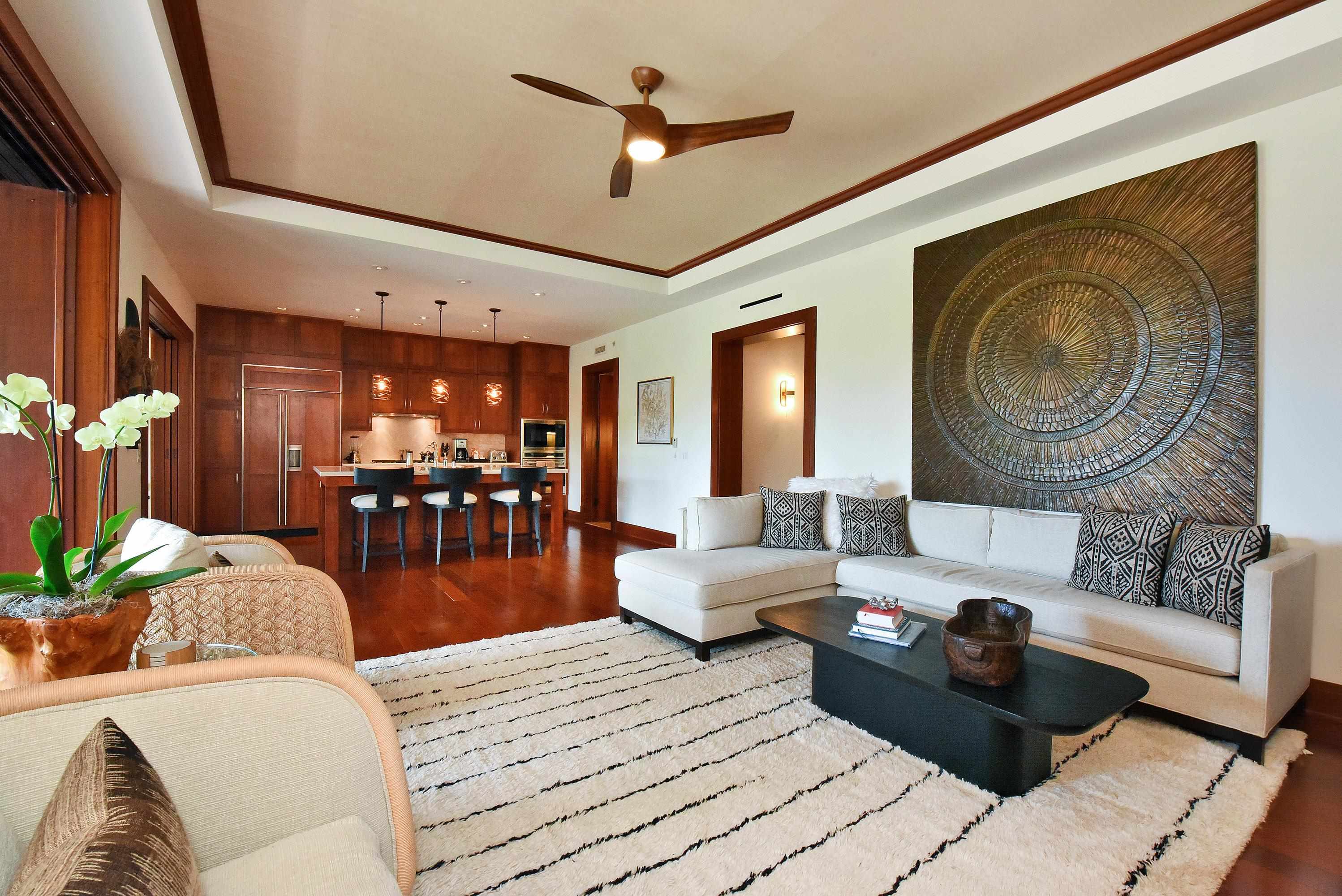 1 Bay Drive, Unit 5102 Lahaina, HI 96761 - Photo 5 of 50 a living room with furniture and a wooden floor