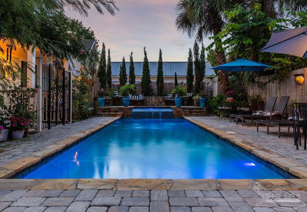 714 East La Rua Street Pensacola, FL 32501 - Photo 39 of 63 a view of swimming pool with outdoor seating and a patio
