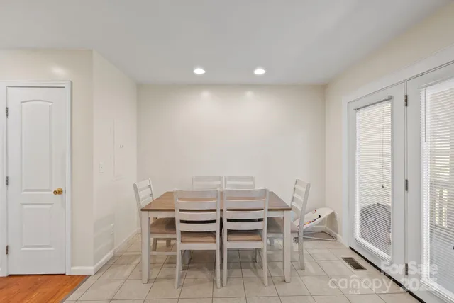 a view of a room with table and chair