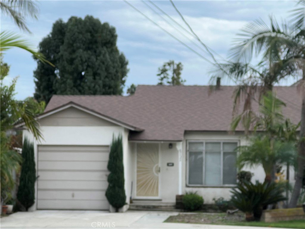 8732 Duarte Road San Gabriel, CA 91775 - Photo 4 of 6 a front view of a house with a garden