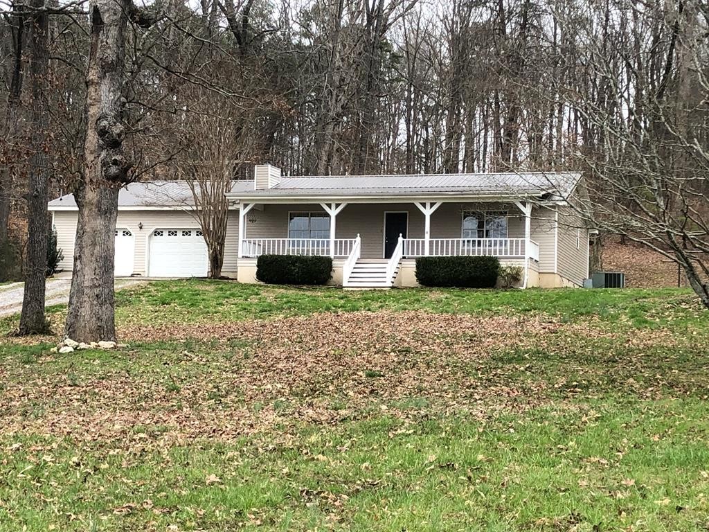 161 East Armuchee Road LaFayette, GA 30728 - Photo 1 of 20 front view of a house with a garden