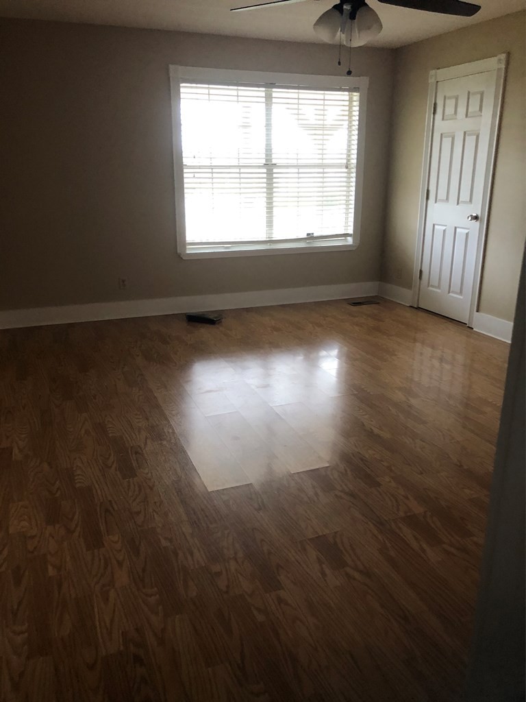 161 East Armuchee Road LaFayette, GA 30728 - Photo 17 of 20 an empty room with wooden floor and windows