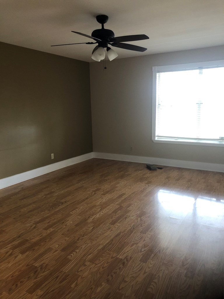 161 East Armuchee Road LaFayette, GA 30728 - Photo 18 of 20 an empty room with wooden floor fan and windows