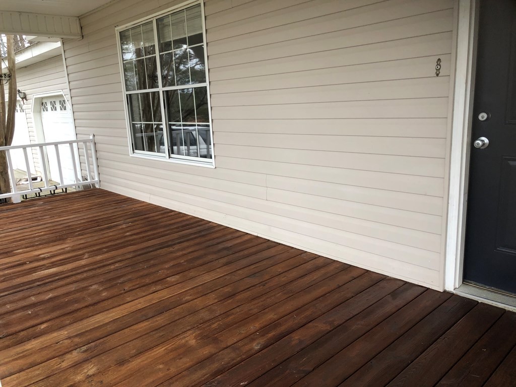 161 East Armuchee Road LaFayette, GA 30728 - Photo 3 of 20 a view of an empty room with wooden floor and a window
