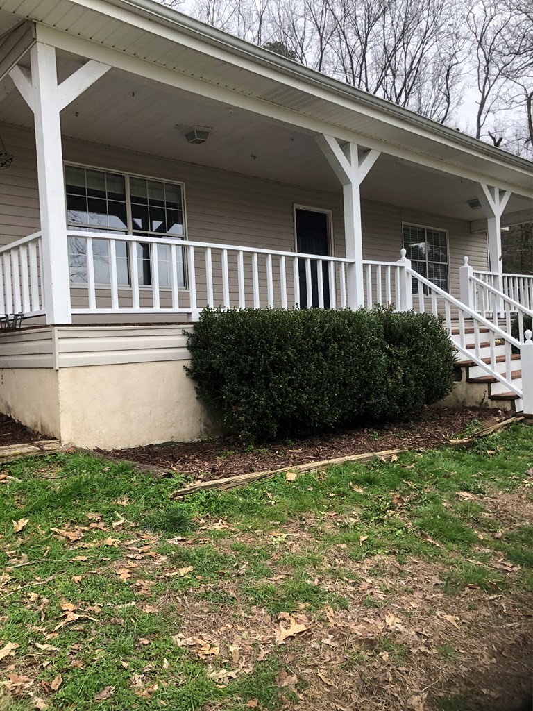 161 East Armuchee Road LaFayette, GA 30728 - Photo 4 of 20 a view of house with backyard and garden