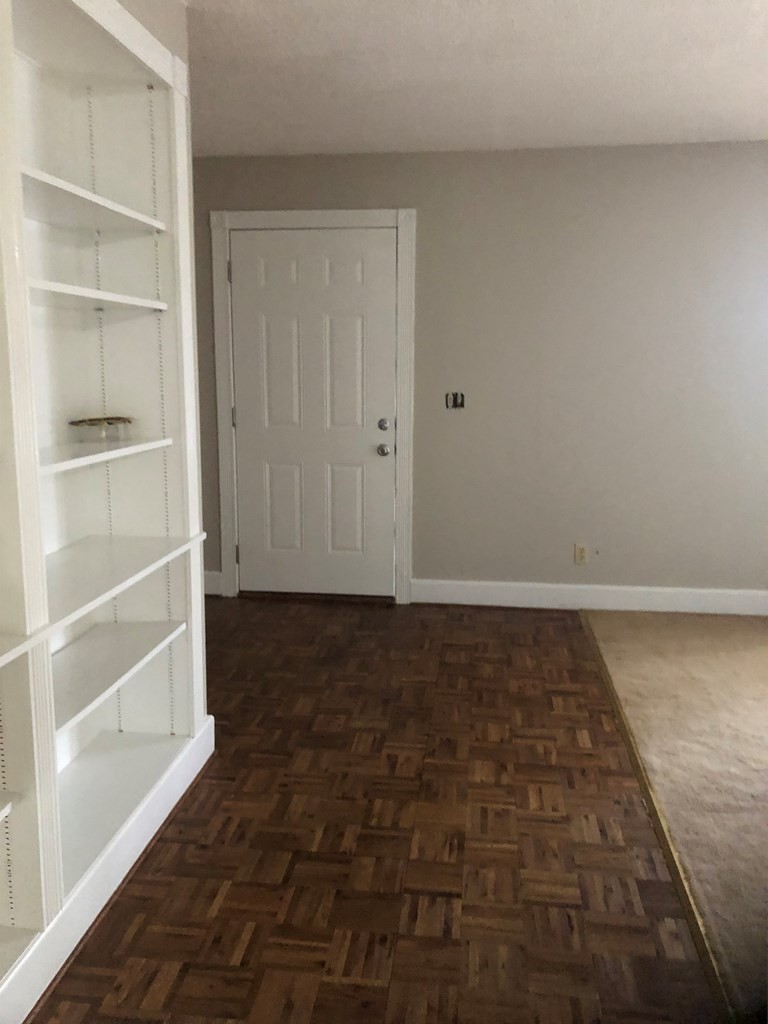 161 East Armuchee Road LaFayette, GA 30728 - Photo 7 of 20 a view of a room with an empty space and wooden floor