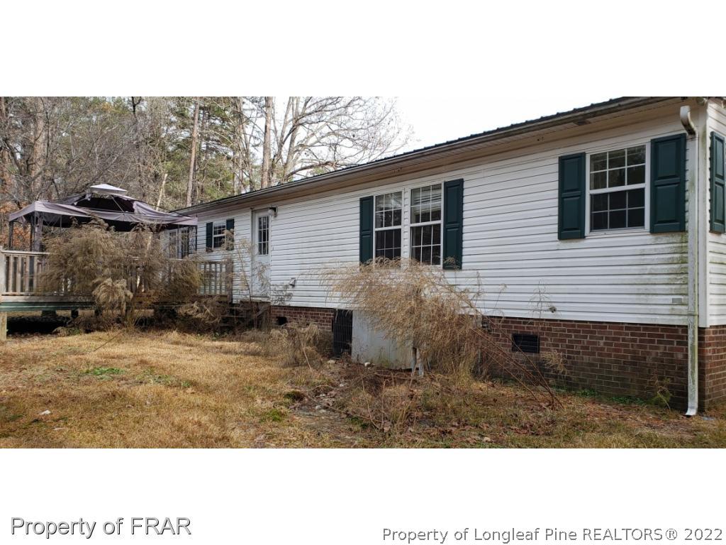 272 Town Branch Road Vass, NC 28394 - Photo 2 of 20 a view of backyard of the house
