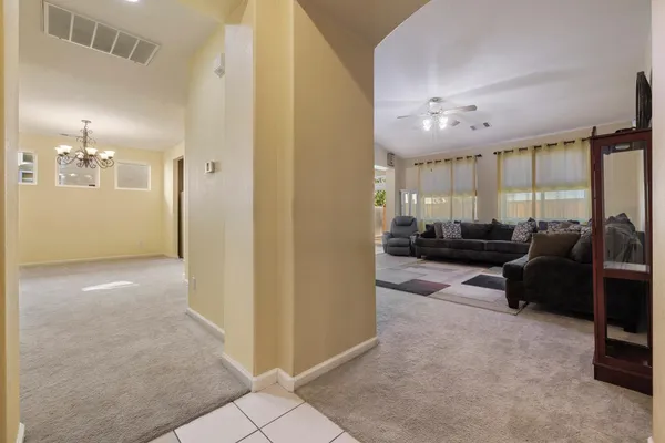 a view of a livingroom with furniture and windows