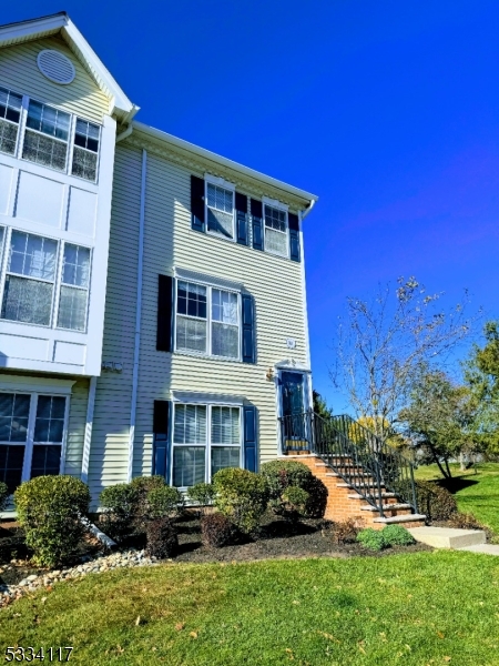 3206 French Drive Bridgewater, NJ 08807 - Photo 2 of 18 a front view of a house with a yard