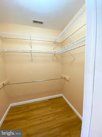 a view of a room with an empty space