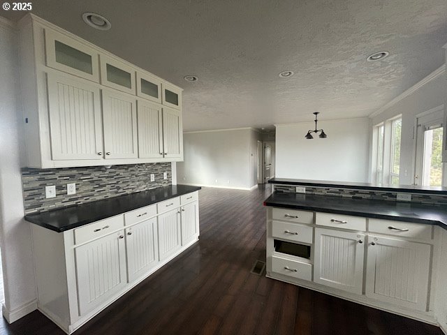 9290 Southwest 3115th Road Culver, OR 97734 - Photo 5 of 21 a kitchen with granite countertop white cabinets and sink