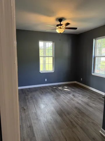 a view of an empty room and window