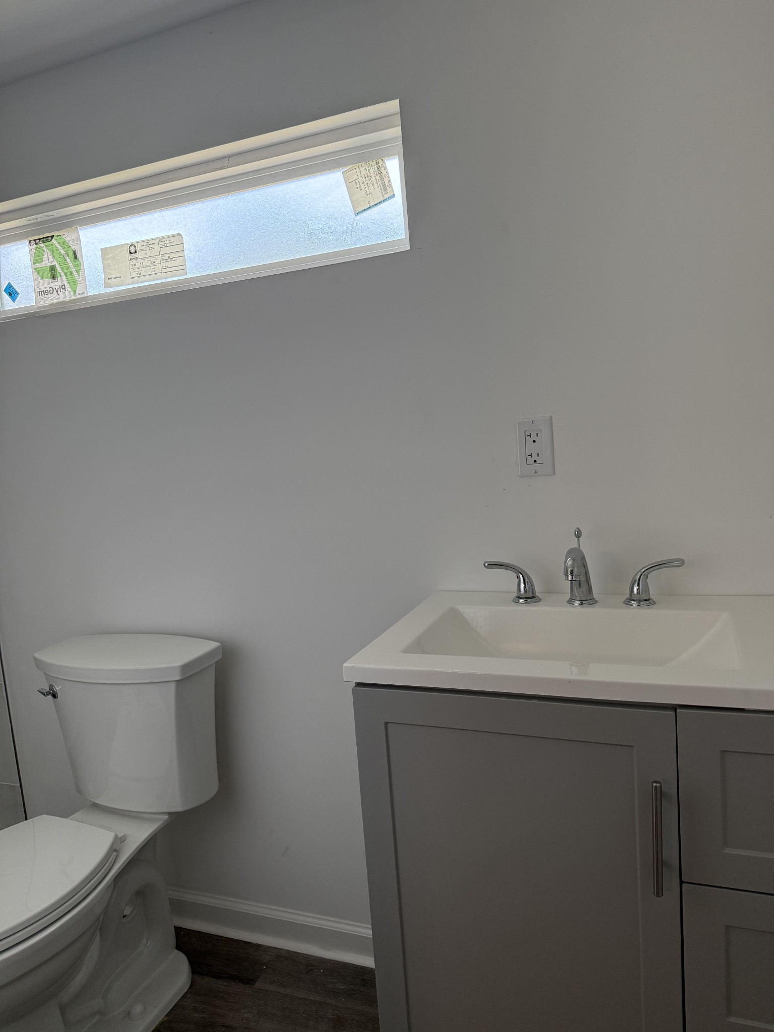 975 Witcher Hollow Road Red Boiling Springs, TN 37150 - Photo 17 of 28 a bathroom with a toilet sink and mirror
