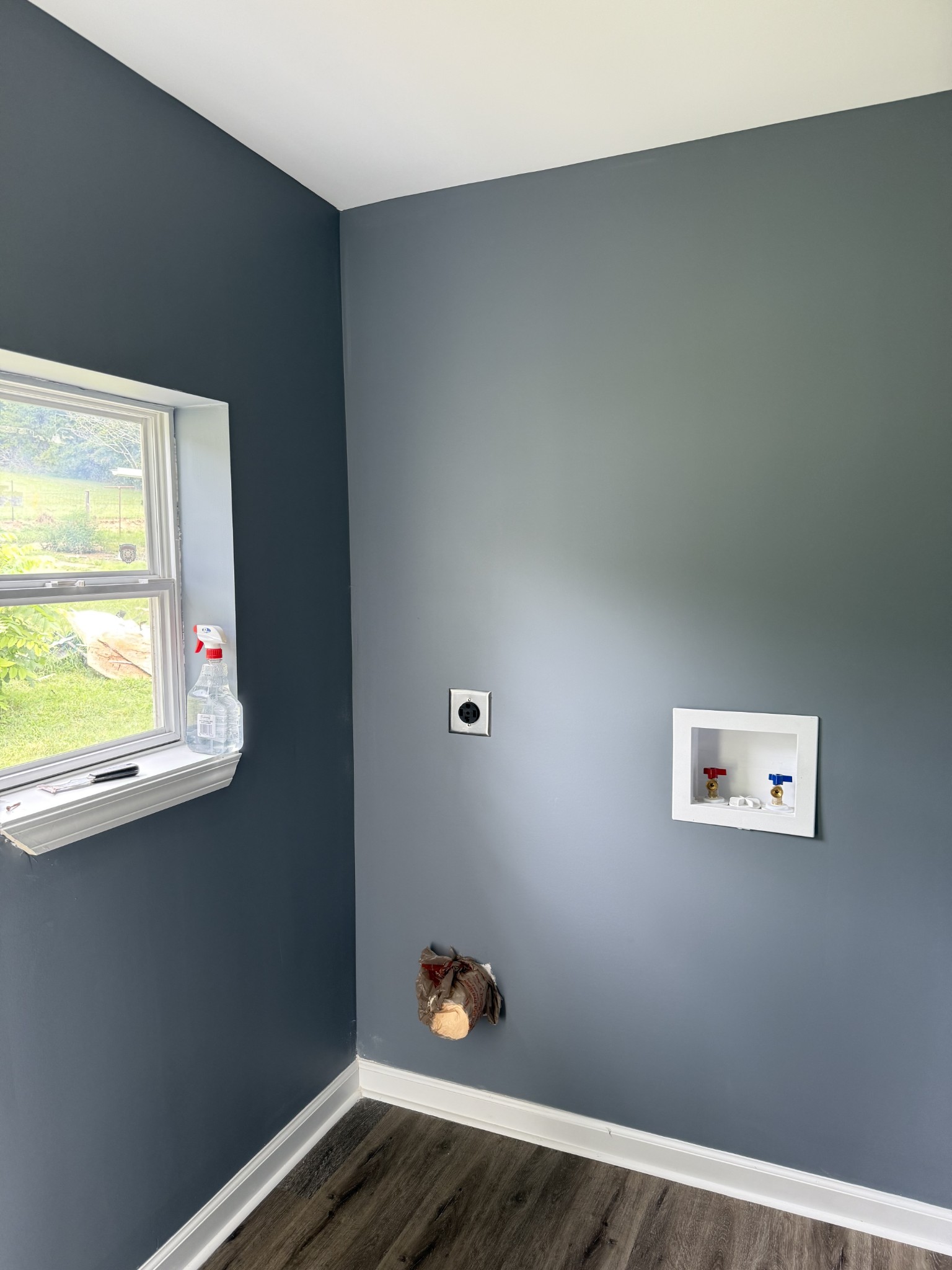 975 Witcher Hollow Road Red Boiling Springs, TN 37150 - Photo 22 of 28 a view of an empty room with wooden floor and a window