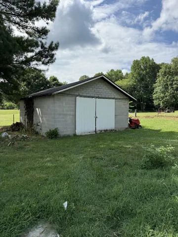 a fire hydrant in the middle of a field