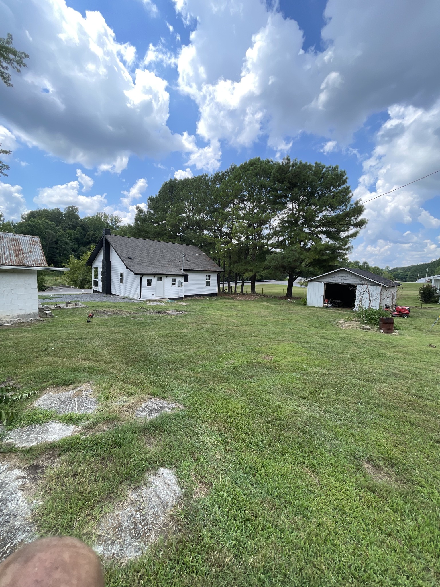 975 Witcher Hollow Road Red Boiling Springs, TN 37150 - Photo 25 of 28 a view of a house with a big yard