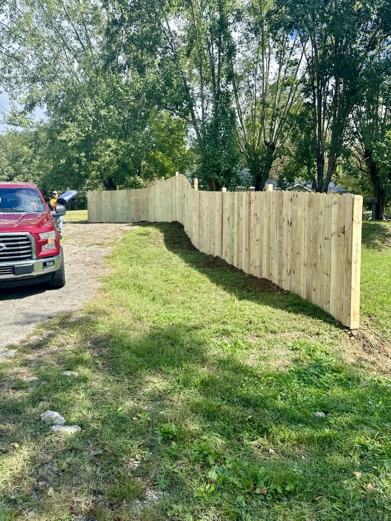 975 Witcher Hollow Road Red Boiling Springs, TN 37150 - Photo 27 of 28 a view of a yard with a car parked in front of it