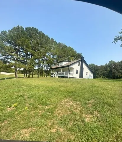 a house with river in front of it