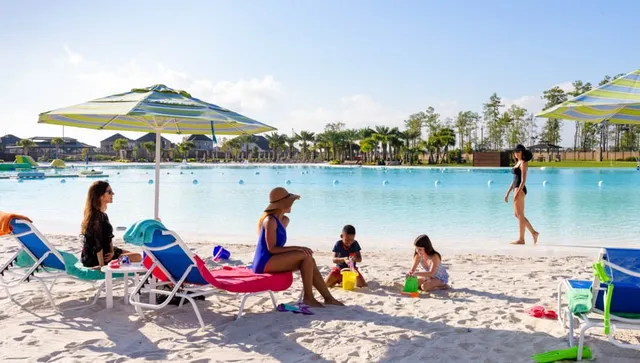 an aerial view of a house with a swimming pool