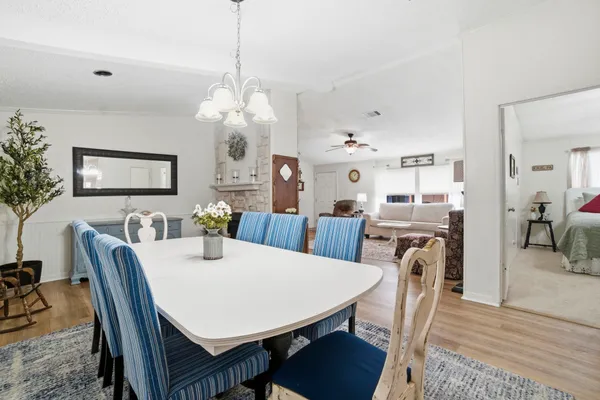 a view of a dining room with furniture