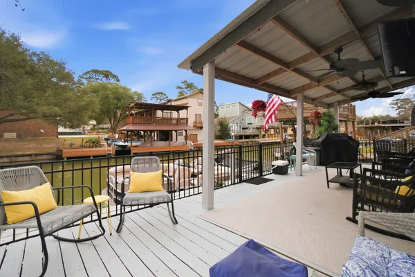 a view of a chairs and tables in the patio
