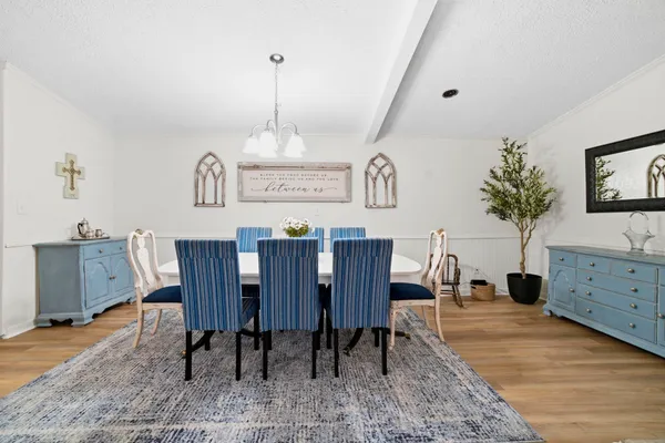 a view of a dining room with furniture