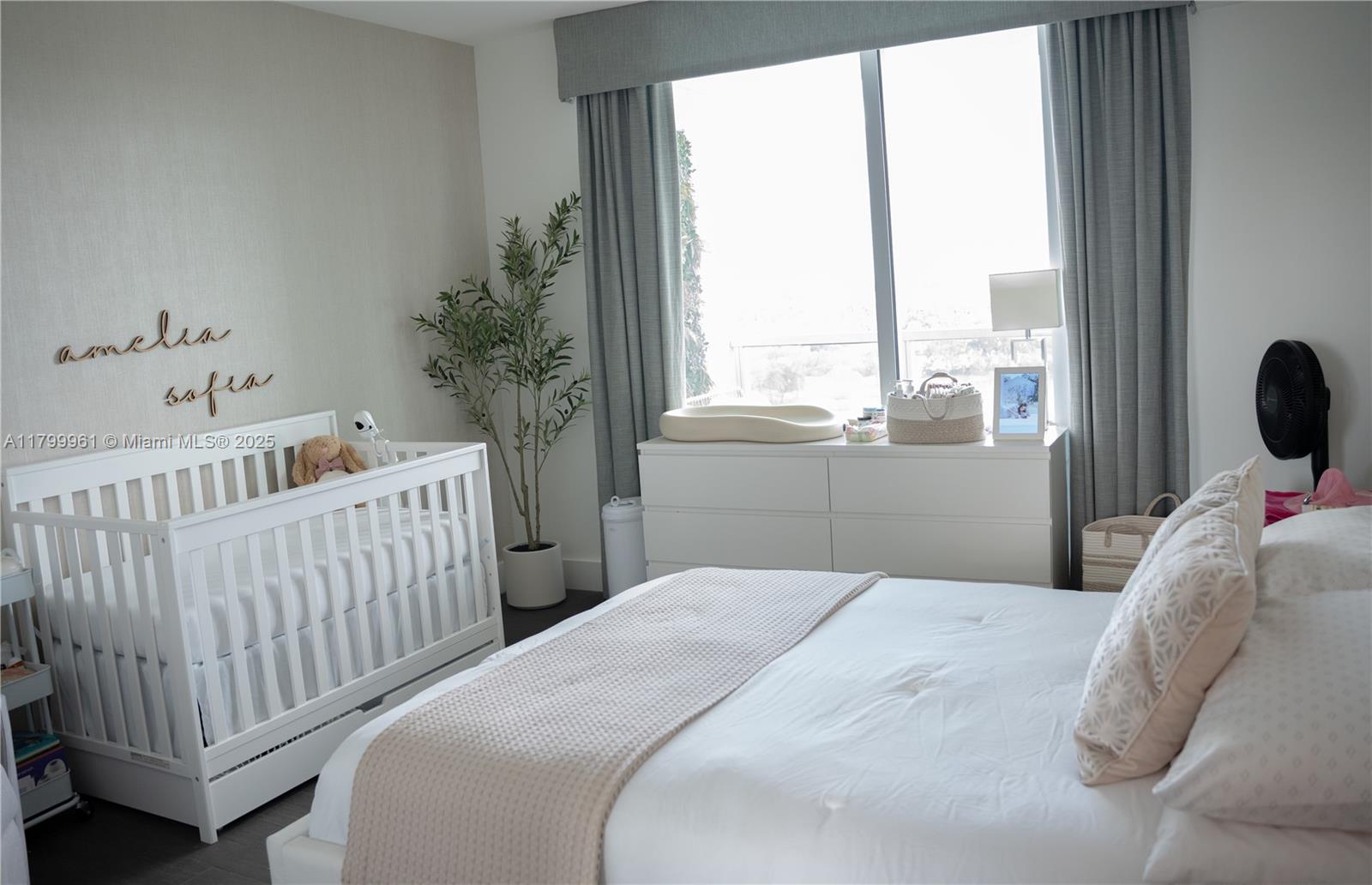 2681 North Flamingo Road, Unit 1206S Sunrise, FL 33323 - Photo 15 of 27 a bedroom with a bed and window