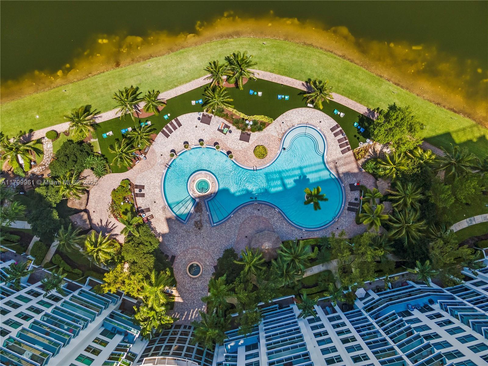 2681 North Flamingo Road, Unit 1206S Sunrise, FL 33323 - Photo 22 of 27 an aerial view of a house with a swimming pool yard and outdoor seating