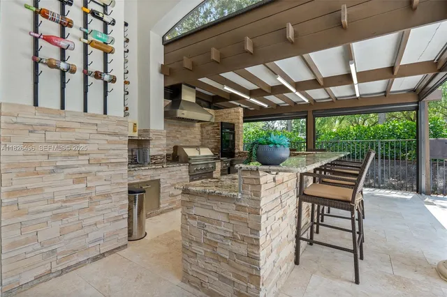 a view of a backyard with sitting area and furniture