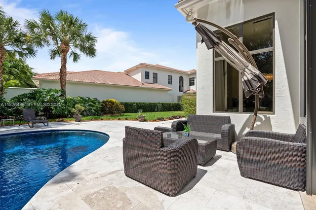 a view of outdoor space yard swimming pool and porch