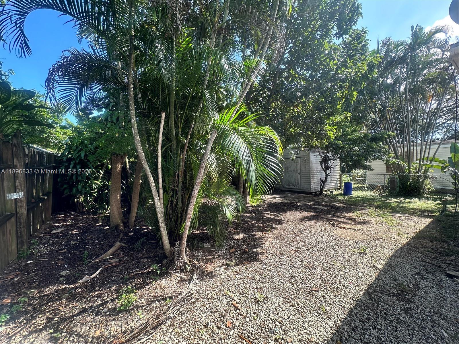 22844 Tradewind Road, Unit H Boca Raton, FL 33428 - Photo 13 of 16 a view of a out door space area