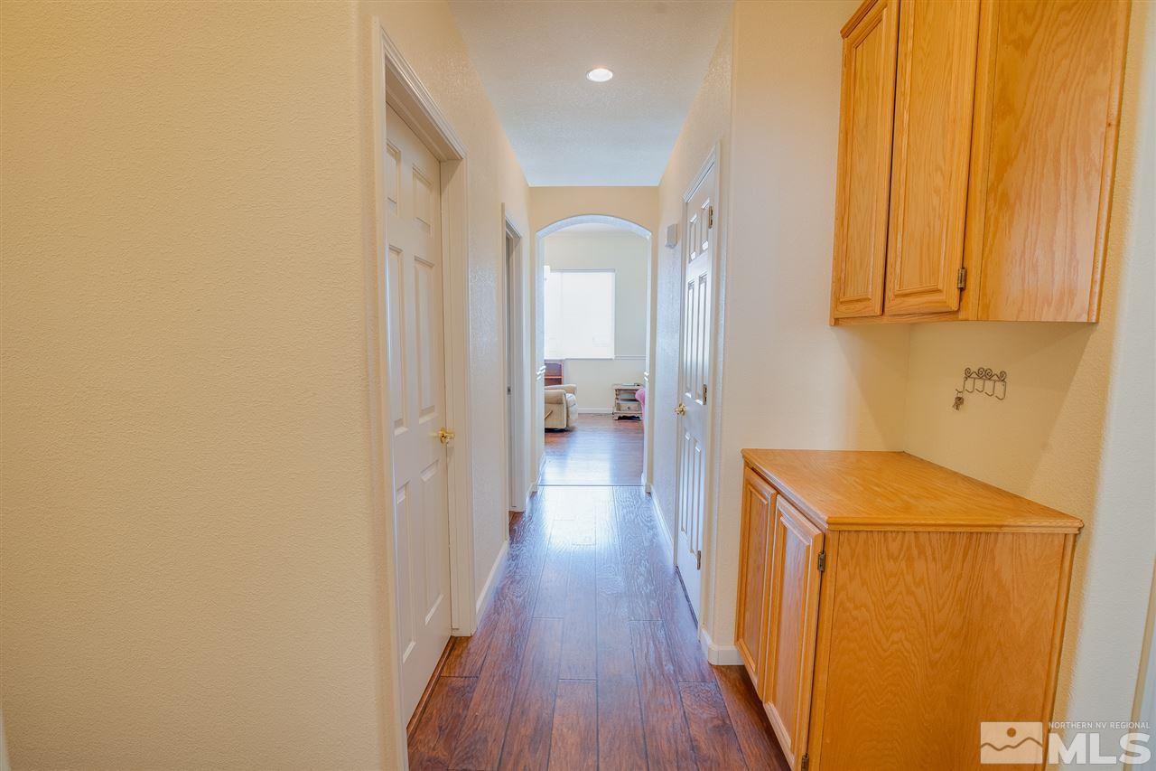 1735 Legacy Village Road Reno, NV 89521 - Photo 11 of 23 a view of hallway with wooden floor