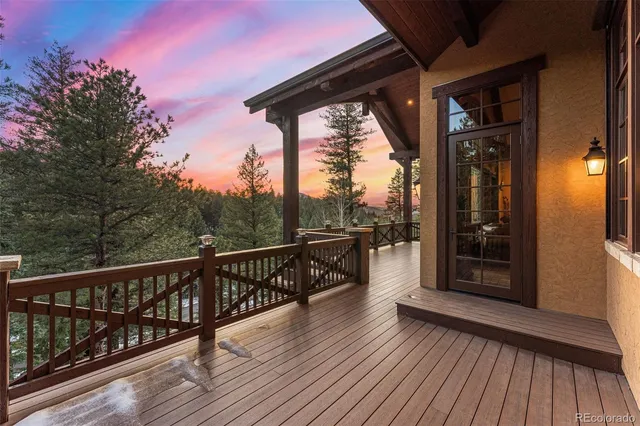 a view of balcony with couch and wooden floor