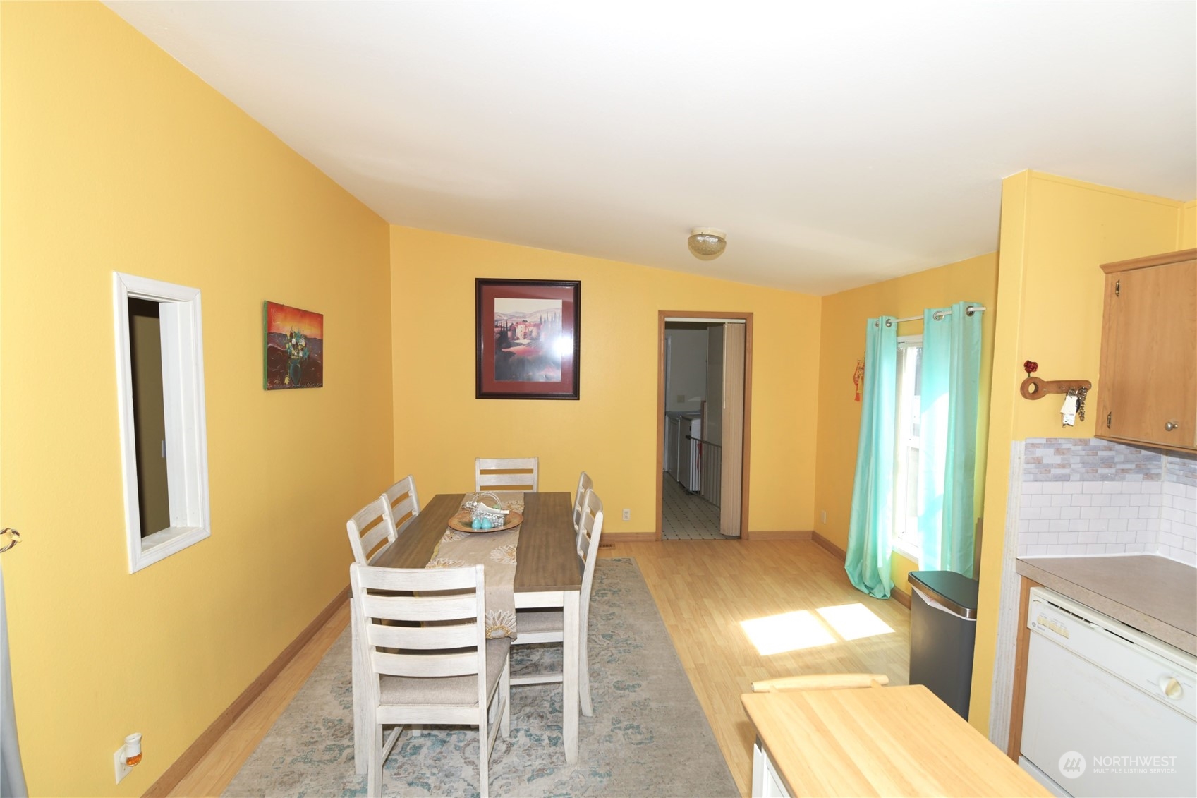 7701 Hardeson Road, Unit 54B Everett, WA 98203 - Photo 7 of 15 a view of a bedroom with furniture and rug