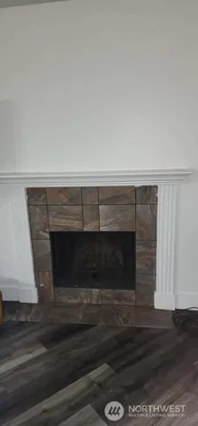 a fireplace with wooden floor