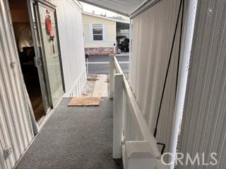 a view of an entryway with a living room