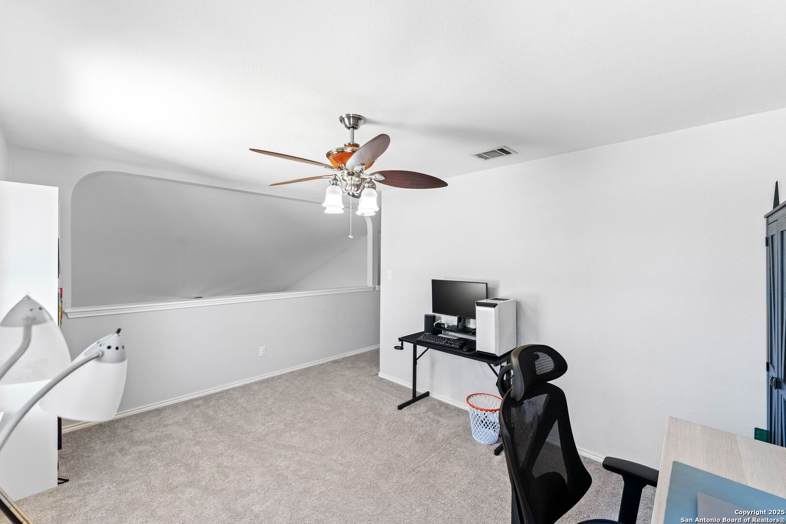 10611 Apple Spring Universal City, TX 78148 - Photo 18 of 29 a view of a workspace with furniture