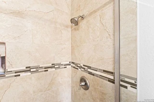 a close view of a bathroom shower