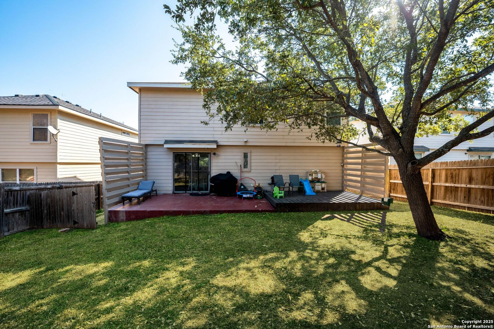 10611 Apple Spring Universal City, TX 78148 - Photo 26 of 29 a view of a house with a yard and sitting area