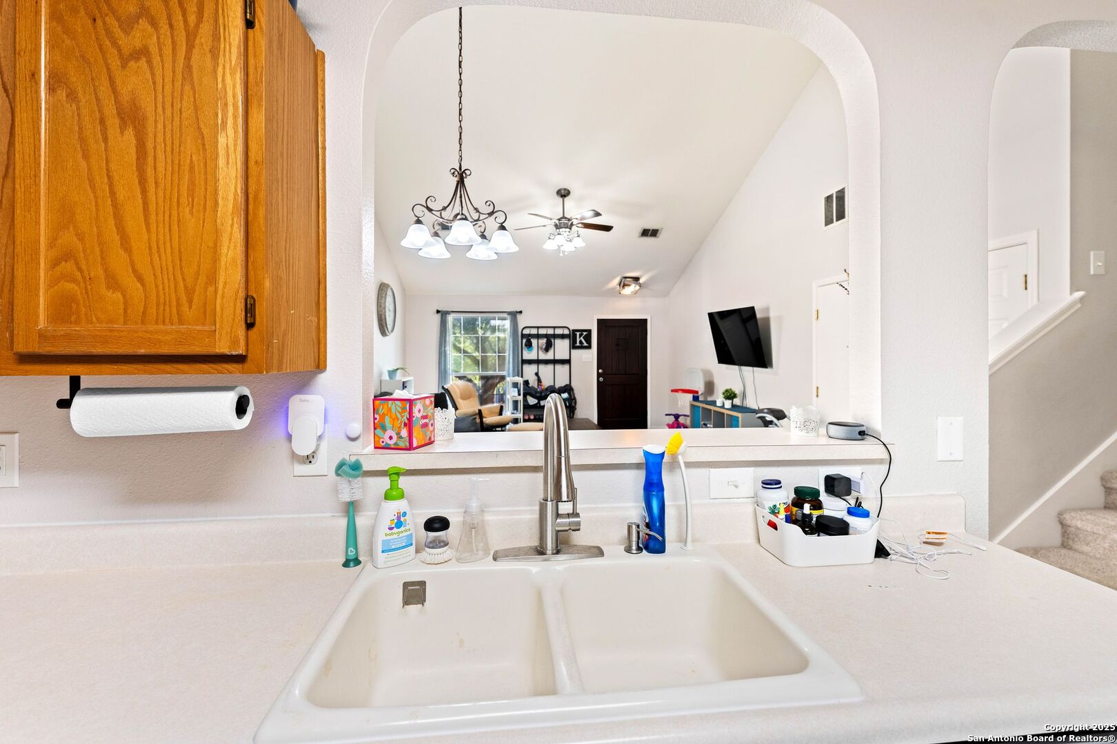 10611 Apple Spring Universal City, TX 78148 - Photo 8 of 29 a white kitchen with a sink