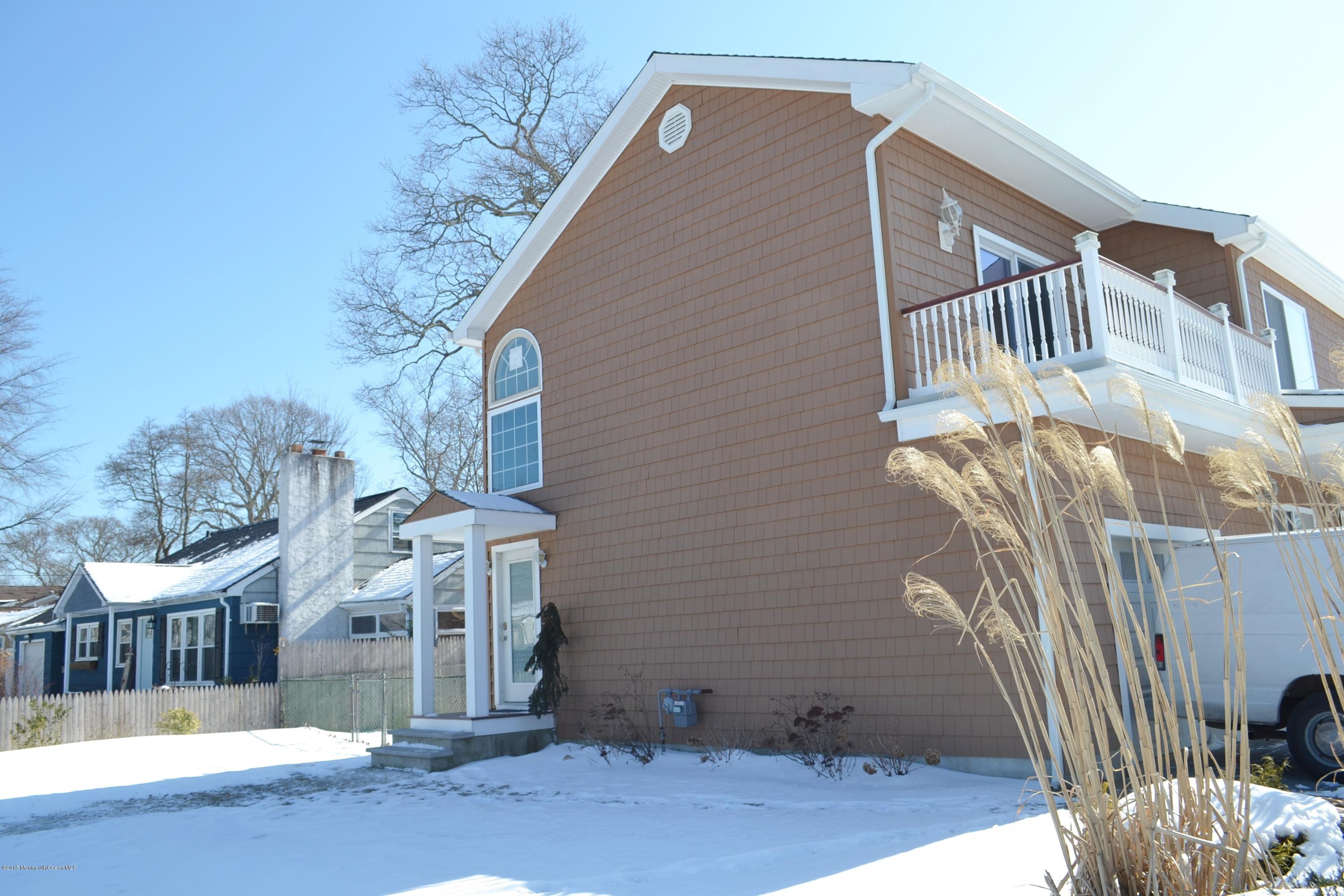 1000 Beaver Dam Road Point Pleasant, NJ 08742 - Photo 29 of 32 a front view of a house with a yard