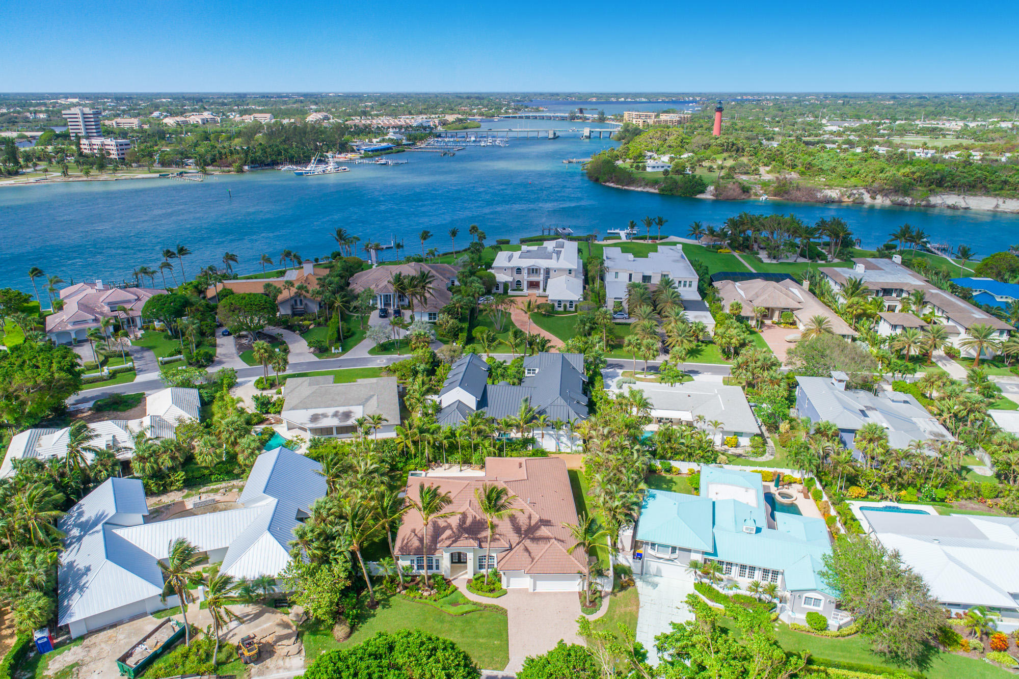 148 Beacon Lane Jupiter Inlet Colony, FL 33469 - Photo 3 of 30 an aerial view of a house with a garden