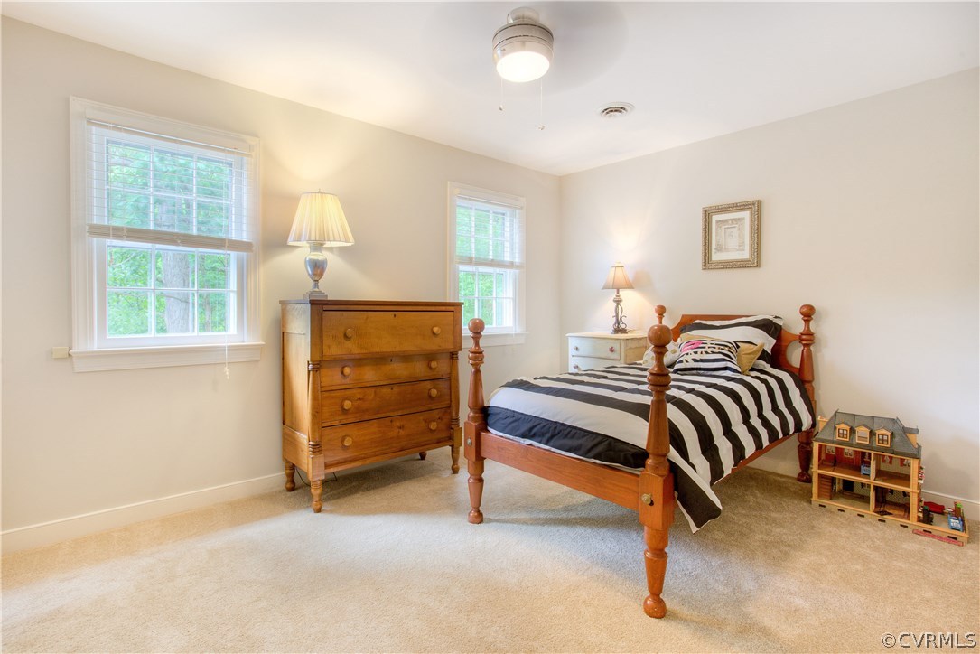 13641 Glendower Road Midlothian, VA 23113 - Photo 21 of 38 a bedroom with furniture and a window